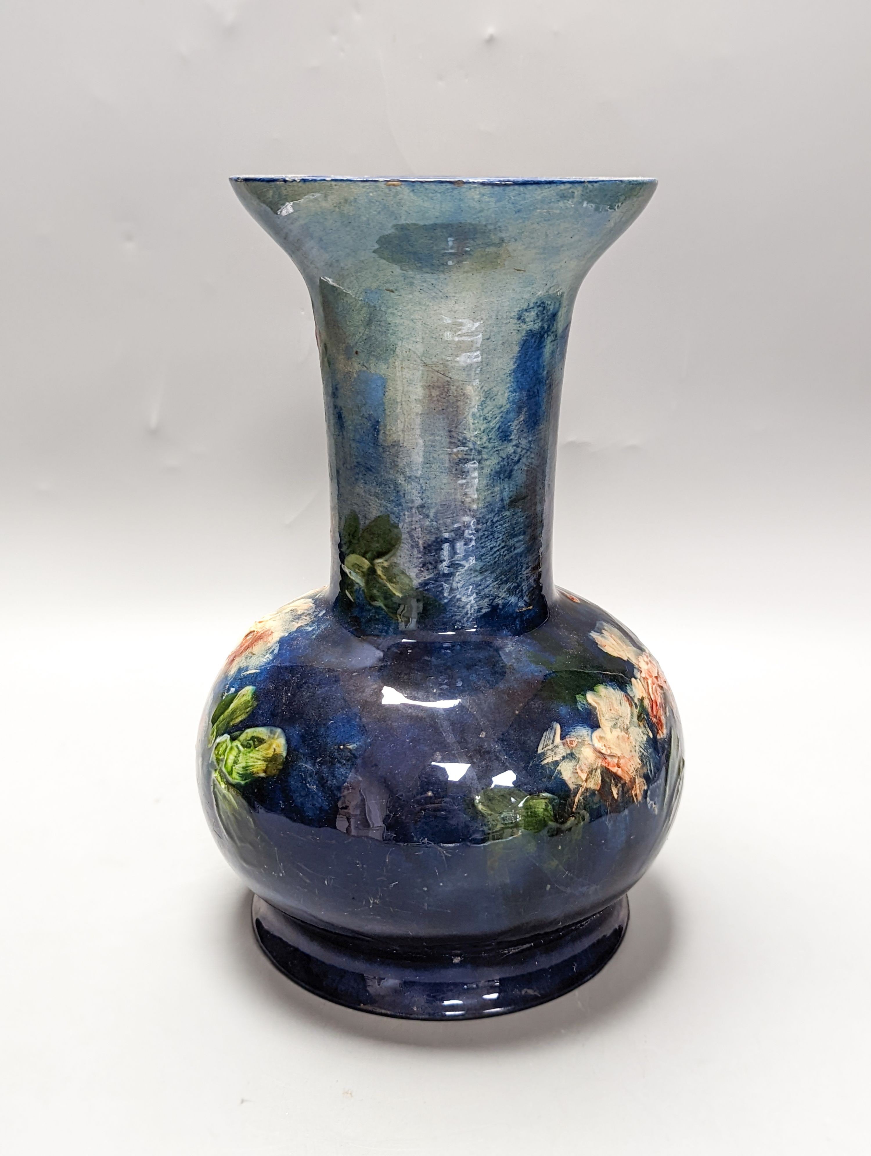 A continental floral painted vase, possibly Belgian. Stamped to underside. 26cm